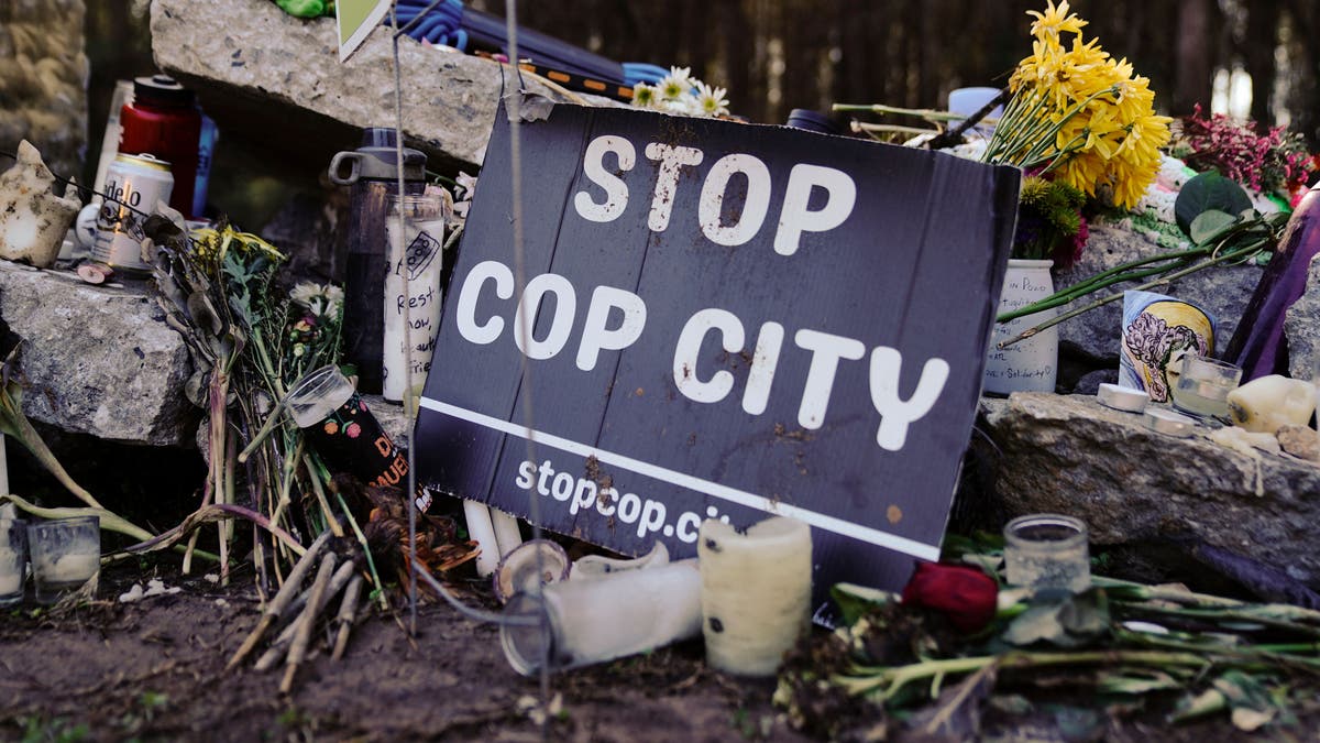 A sign is pictured near the construction site of a police training facility that activists have nicknamed "Cop City" near Atlanta, Georgia, on Feb. 6.