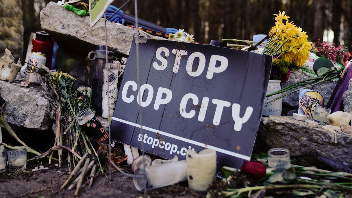 A sign is pictured near the construction site of a police training facility that activists have nicknamed "Cop City" near Atlanta, Georgia, on Feb. 6.