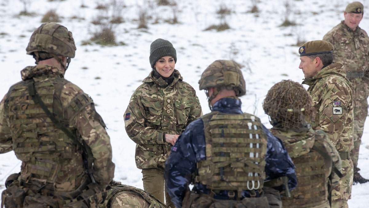 Kate Middleton speaking with soldiers