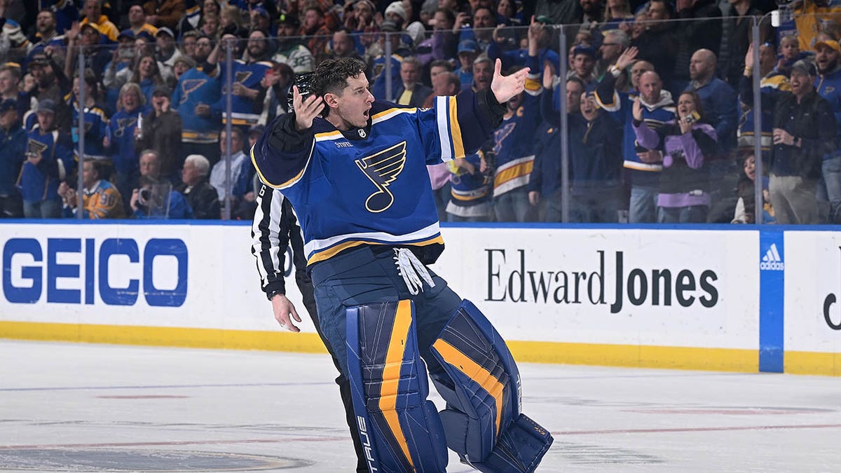 Jordan Binnington pumps the crowd up after a fight