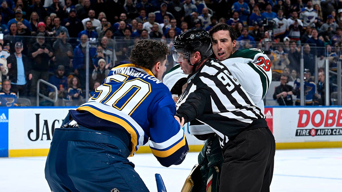 Marc-Andre Fleury tries to fight Jordan Binnington