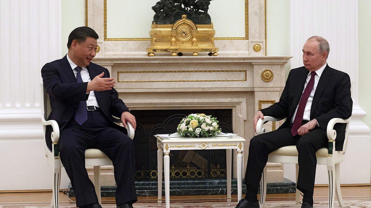 Xi and Putin sitting