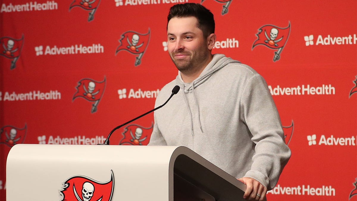 Baker Mayfield talks to the media