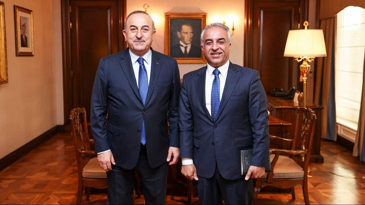 Turkish Foreign Affairs Minister, Mevlut Cavusoglu, left, receives Barzani Charity Foundation President Musa Ahmad in Ankara, Turkiye.