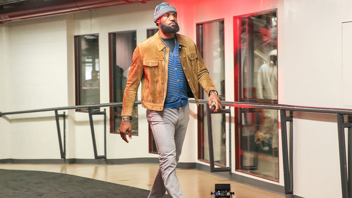 LeBron James arrives before a game