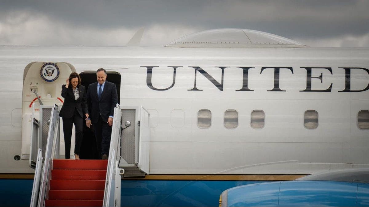 Vice President Kamala Harris and Second Gentleman Doug Emhoff disembark Air Force Two