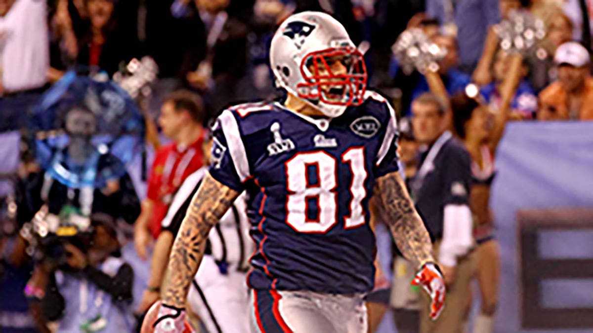 Aaron Hernandez celebrates a touchdown