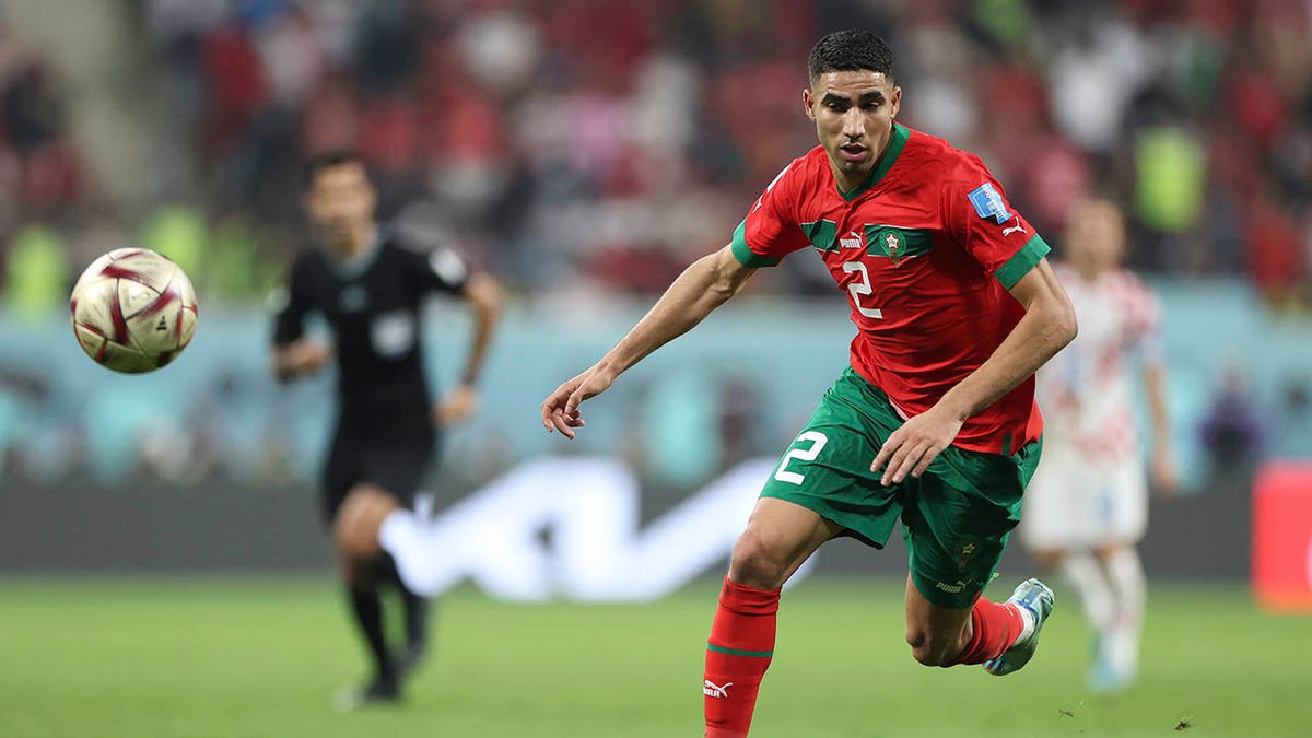 Achraf Hakimi plays for Morocco during the World Cup