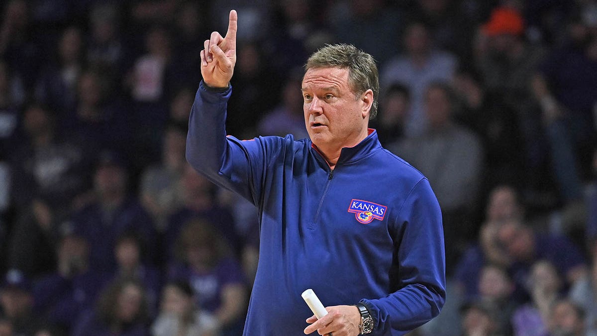 Bill Self on the court during a KU game