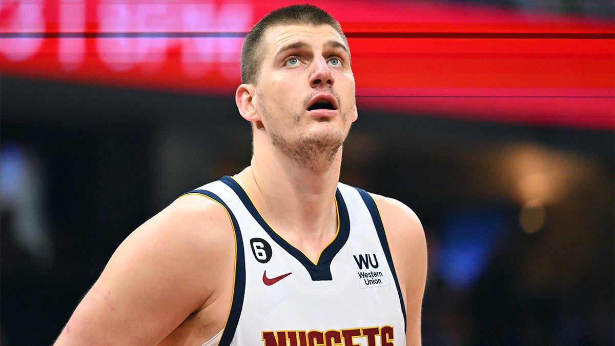 Nikola Jokic plays against the Cavs