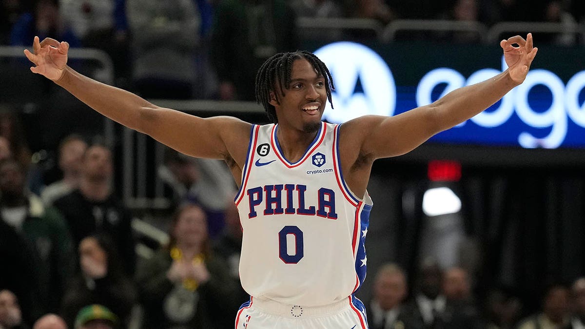 Tyrese Maxey celebrates after a basket