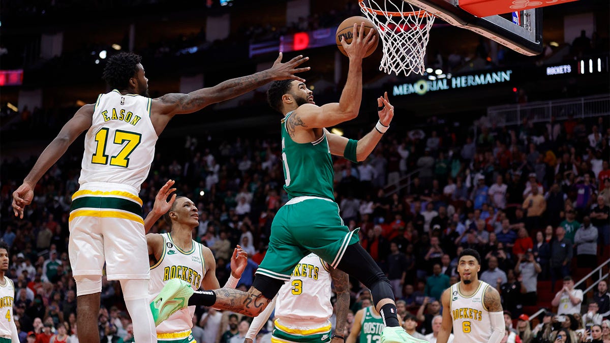 Jayson Tatum drives for an end-of-game layup