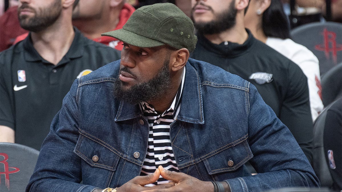 LeBron James watches the Lakers play the Rockets