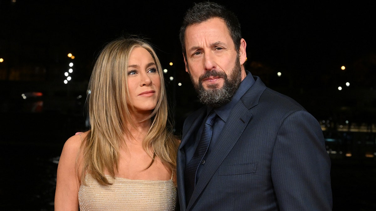 Adam Sandler and Jennifer Aniston in Paris prmoting "Murder Mystery 2."