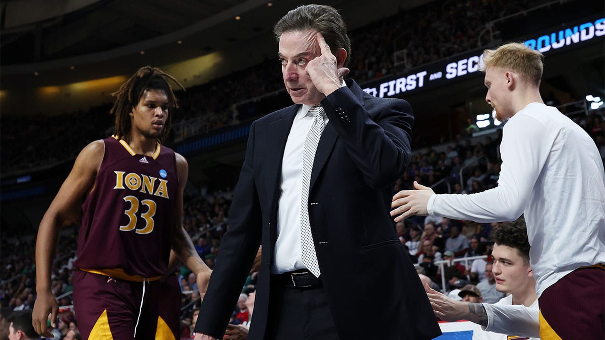 Rick Pitino coaches against UConn