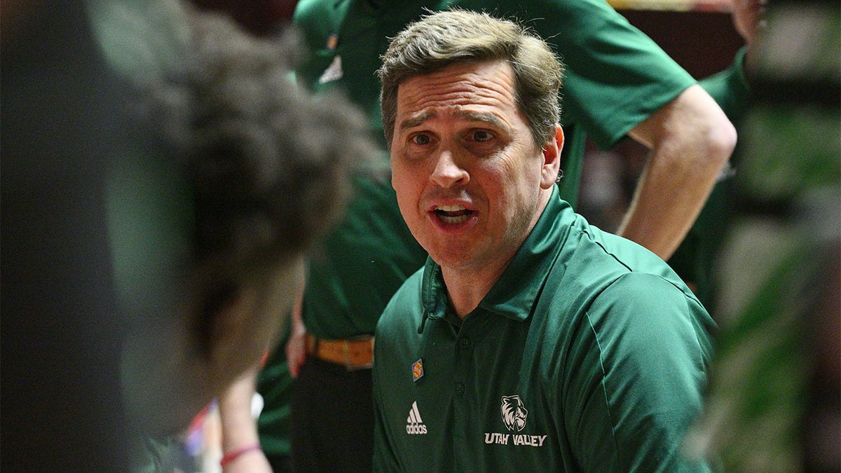 Mark Madsen talks to his Utah Valley players