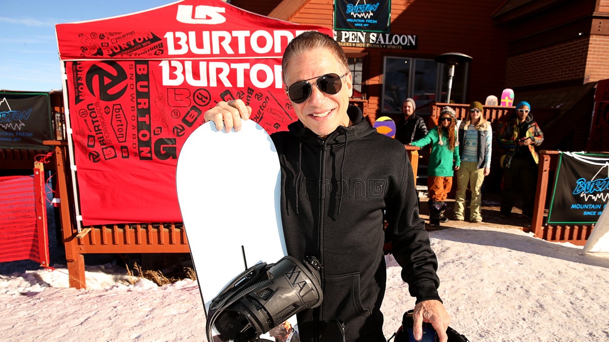 Tony Danza holding a snowboard