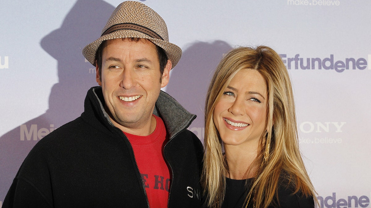 Jennifer Aniston and Adam Sandler at the "Just Go With It" premiere in Germany