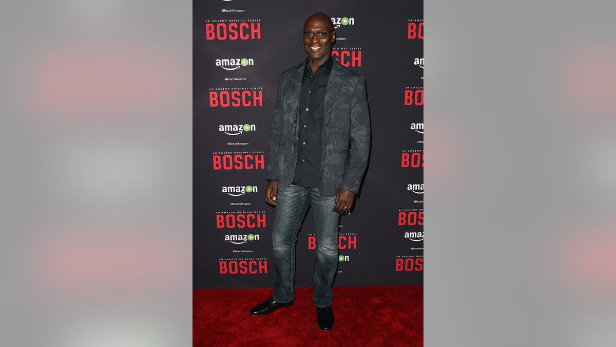 lance reddick red carpet