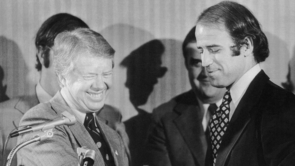 Carter and Biden laughing