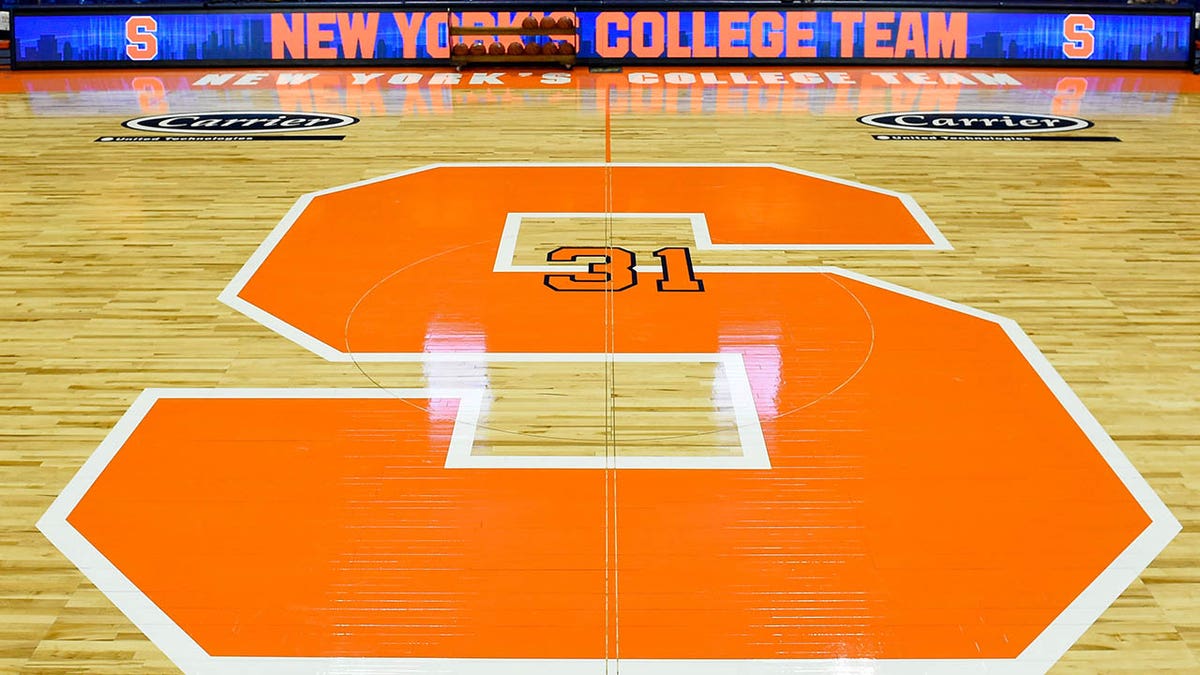 Syracuse Orange logo at a basketball game