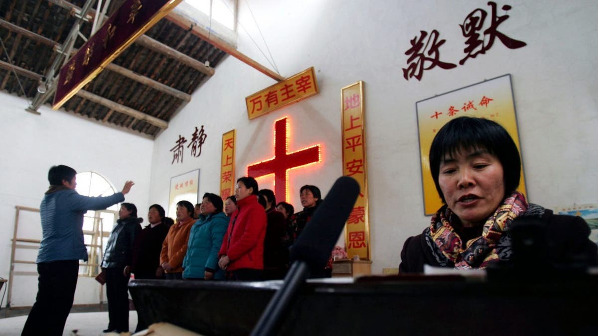 LUOYANG, CHINA - FEBRUARY 21: (CHINA OUT) A choir sings during a rehearsal for a performance marking the Chinese New Year at a country church on February 21, 2007 in Luoyang, Henan province, China. Chinese people around the world celebrate the Lunar New Year of the Pig.