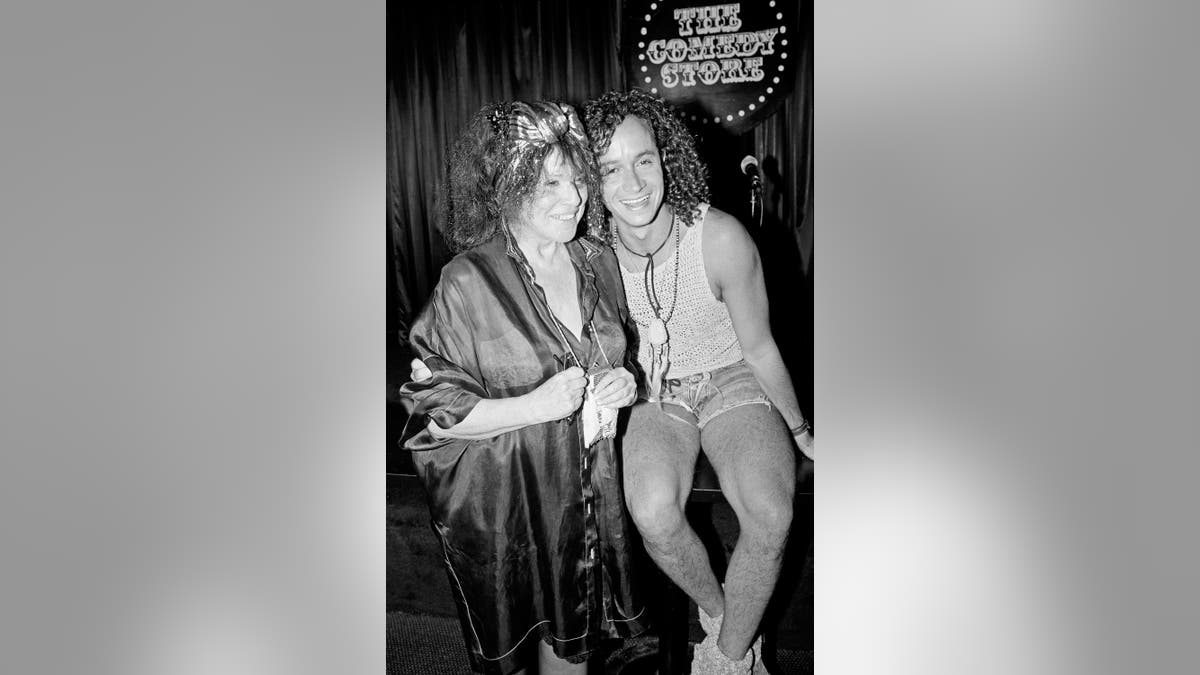 Black and white photo of Mitzi Shore with son Pauly Shore