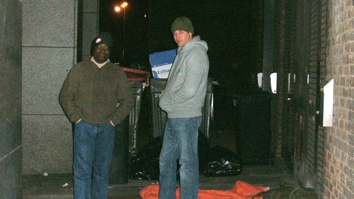 Prince William readying to sleep on a London street