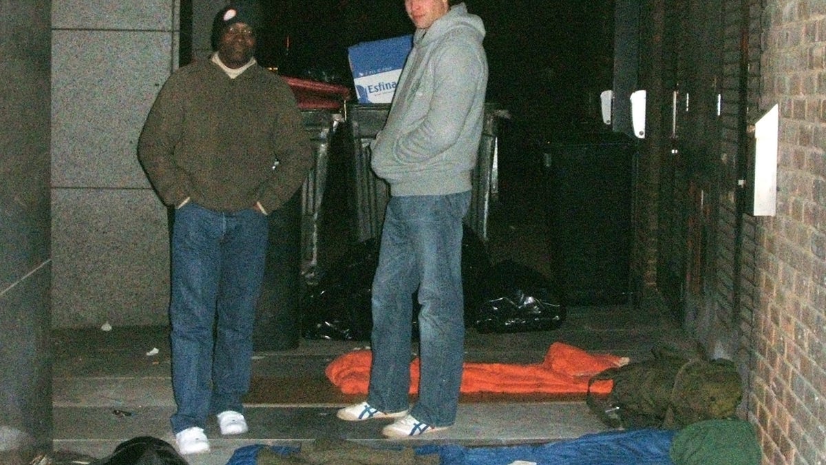 Prince William readying to sleep on a London street