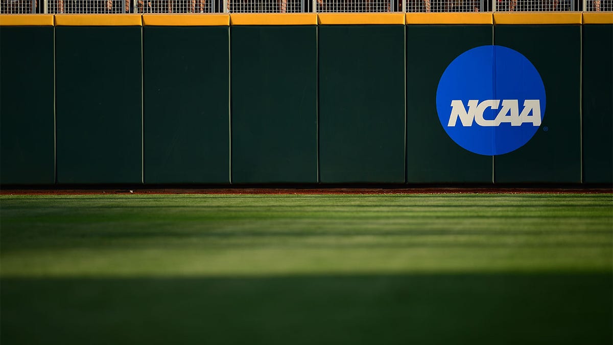 The NCAA logo on the outfield wall
