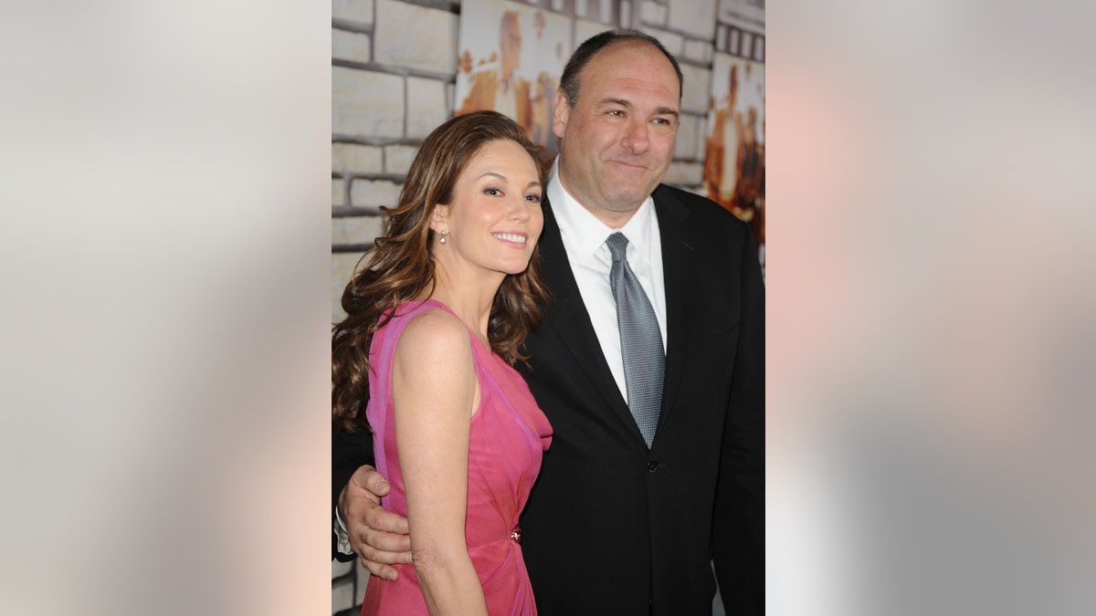 Diane Lane and James Gandolfini embracing each other at a film premiere