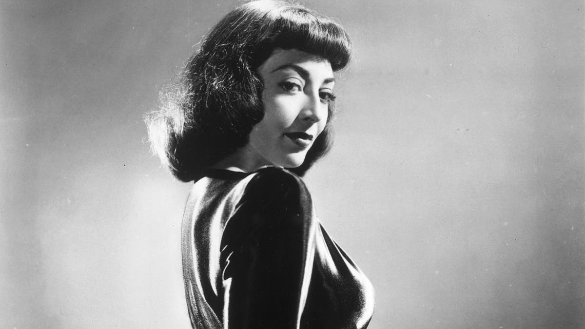 A close-up black and white photo of Marie Windsor