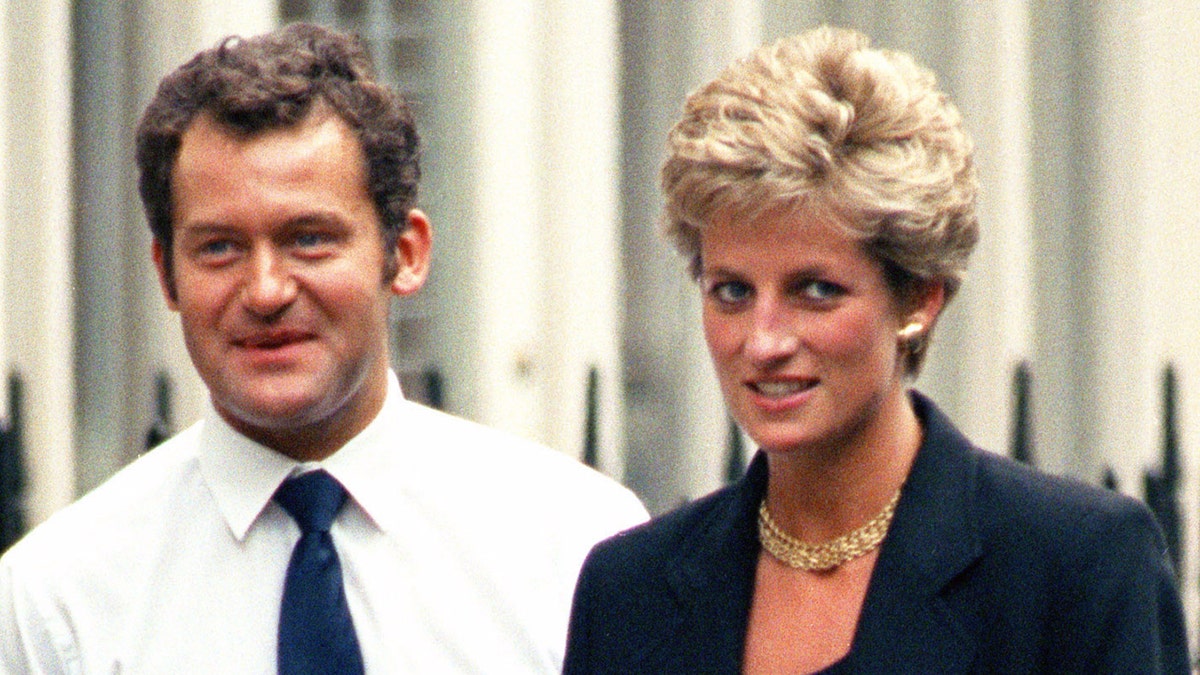 A close-up of Paul Burrell in a white shirt and tie standing next to Princess Diana wearing a dark dress