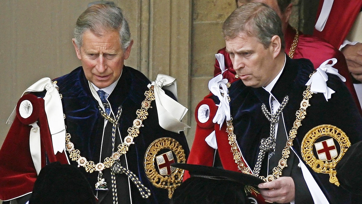 King Charles and Prince Andrew wearing royal regalia