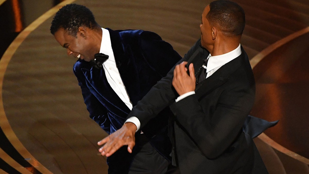 Will Smith slapping Chris Rock during the Oscars