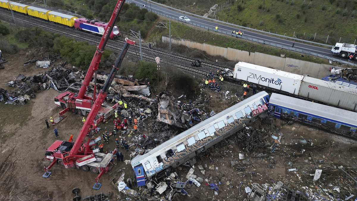 Greece train crash wreckage cleanup