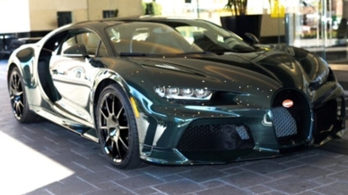 Bugatti parked on paving stones