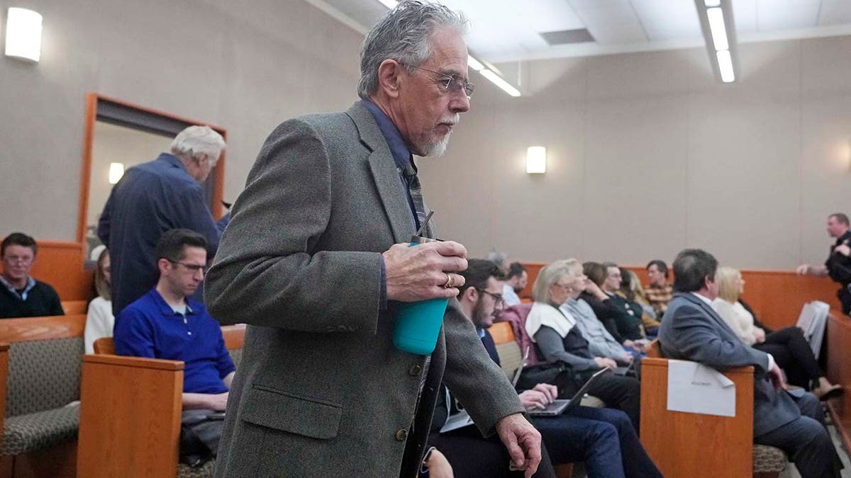 Terry Sanderson walks into the courtroom.