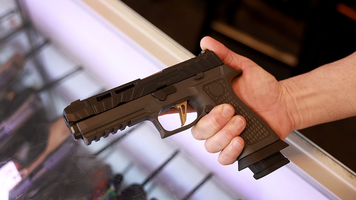 Sig Sauer P320 handgun seen in gun store in Florida