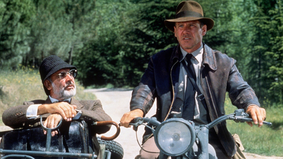 Harrison Ford and Sean Connery filming a scene for "The Last Crusdae" on a motorcycle