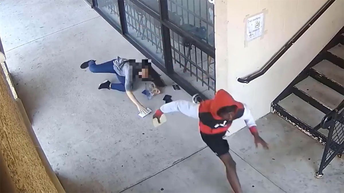 Suspect running away from the victim he pushed to the floor.