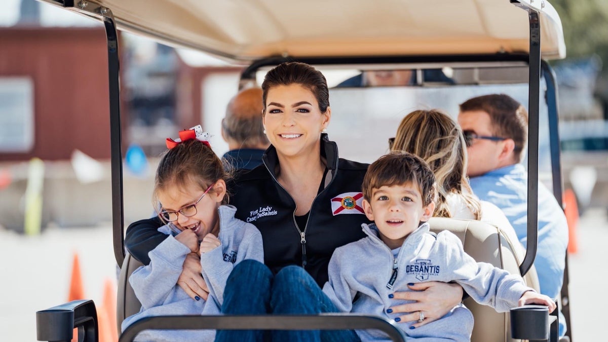 Casey DeSantis (C) and her two children