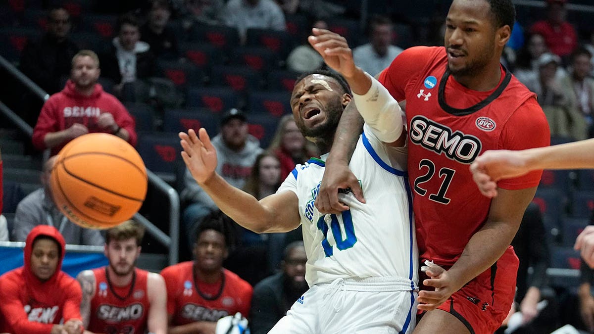 Isaac Mushila vies for a rebound