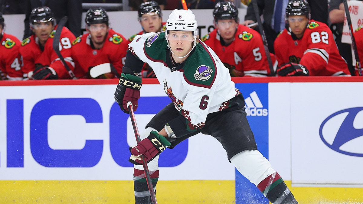 Jakob Chychrun waits for puck