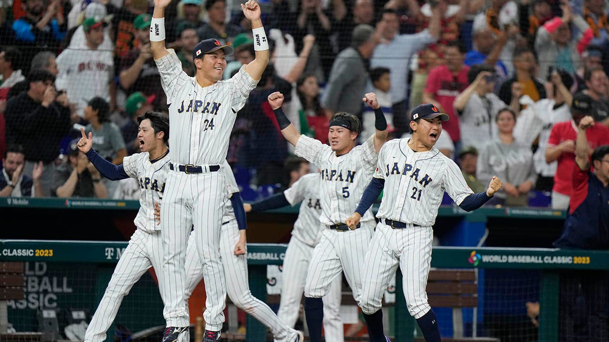 Japan celebrates a run scored