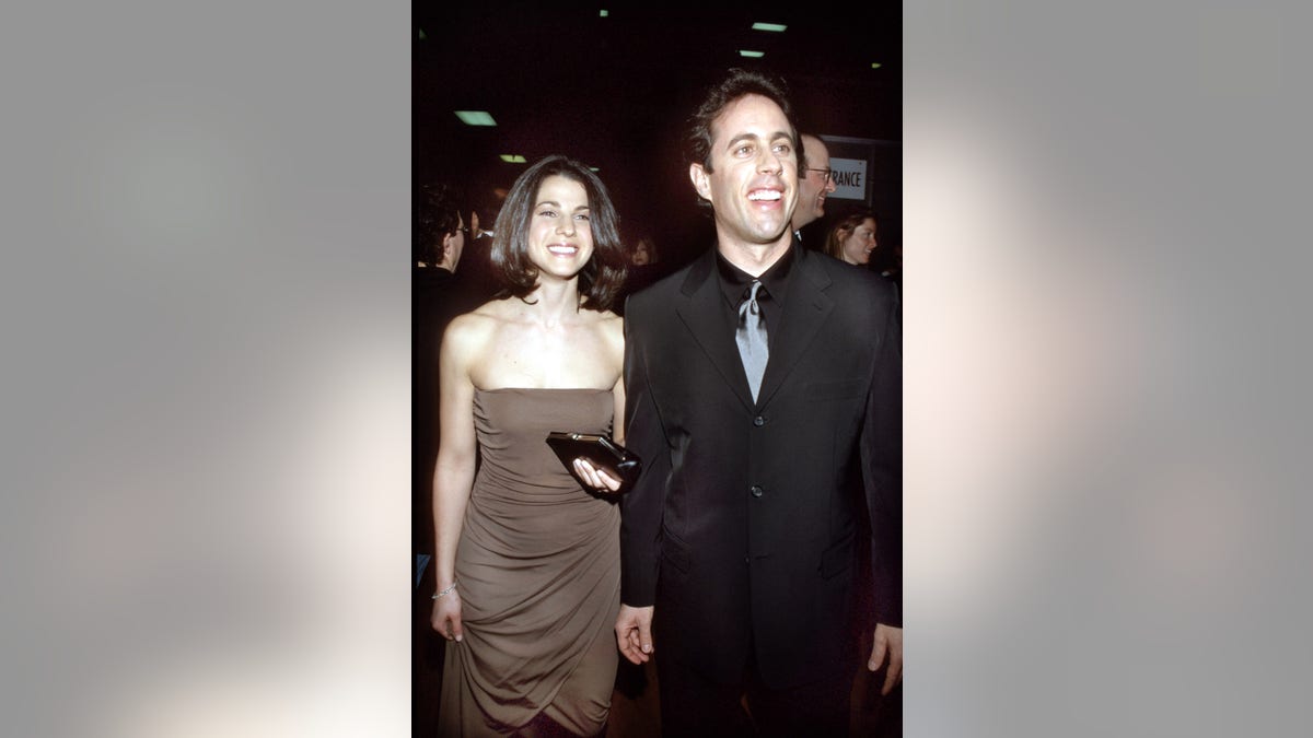 Jerry Seinfeld and his wife in 1999