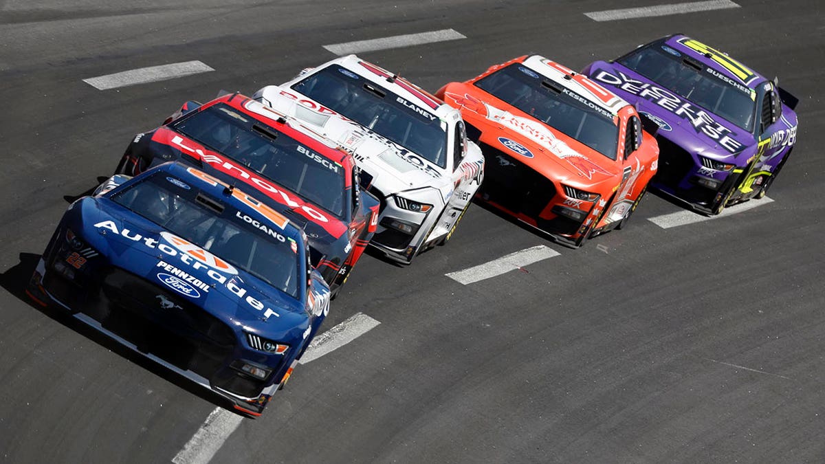 Joey Logano leads the pack