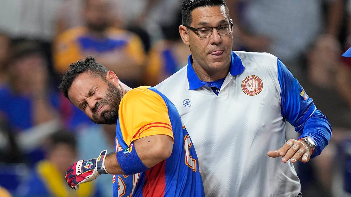 Jose Altuve winces in pain