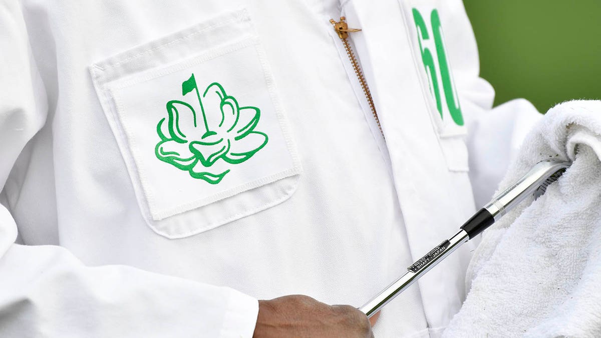 The logo on a caddie's overalls during the Augusta National Women's Amateur tournament on April 6, 2019. (Michael Madrid-USA Today Sports)