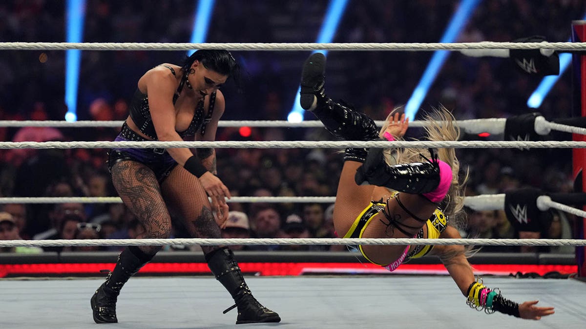 Rhea Ripley tosses Liv Morgan